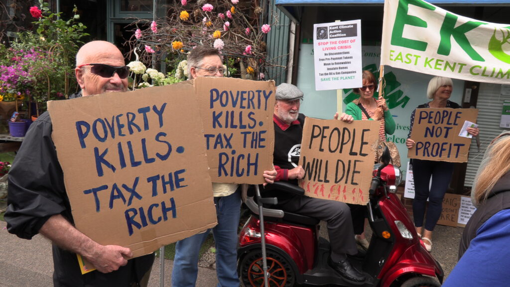 Mackinlay targeted in 'cost-of-greed' protest